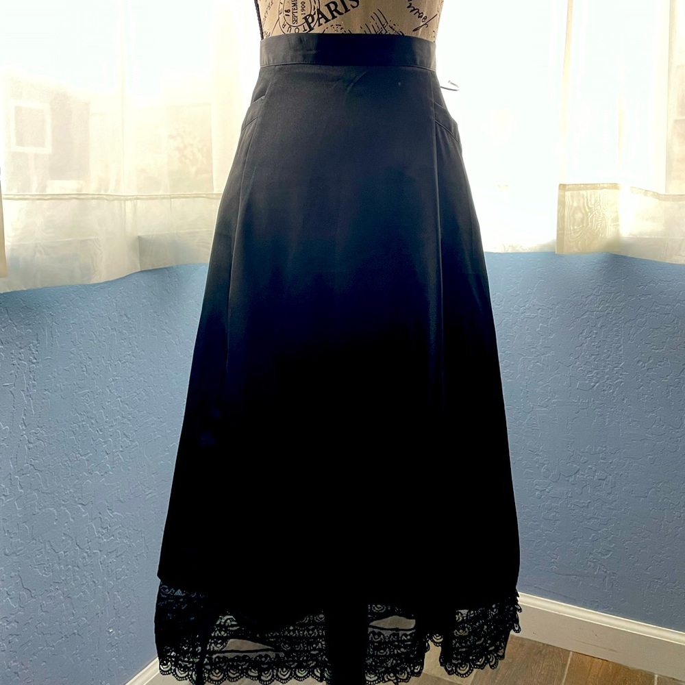 Black E.C. Star, satin look and lace skirt, Large. It has pockets!!!